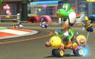 Speel een Yoshi kostuum vrij voor jouw Mii in <a href = https://www.mariowii-u.nl/Wii-U-spel-info.php?t=Mario_Kart_8>Mario Kart 8</a>!